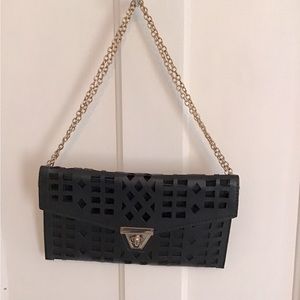 Vegan clutch with chain strap. NWOT